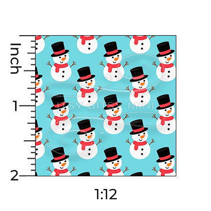 1:12 scale snowman dollhouse wallpaper pattern on a light blue background, shown with inch ruler snowmen are white with black top hats red scarves and orange #color_aqua