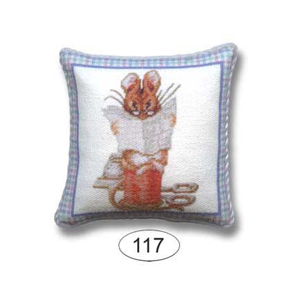 dollhouse pillow with mouse sitting on spool of thread reading newspaper 