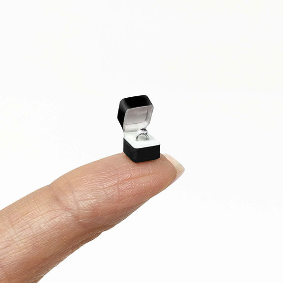 dollhouse miniature engagement ring in black jewelry box