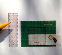 Green Cutting Mat with Rotary Cutter and Clear Quilting Sewing Rulers